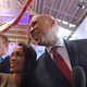 Rosario Dawson and Senator Cory Booker pose for pictures after the fourth Democratic primary debate of the 2020 presidential campaign on October 15, 2019.